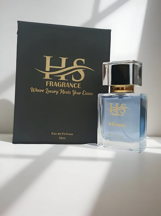 Perfume bottle and packaging with 'HS Fragrance' branding on a white surface.